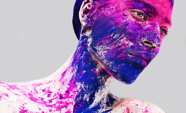 Woman with purple paint via Archillect